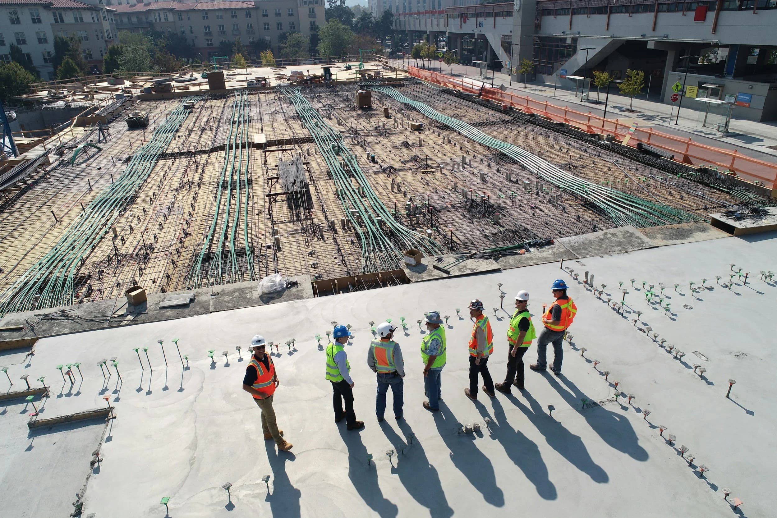 Project crew on site reviewing a large commercial build